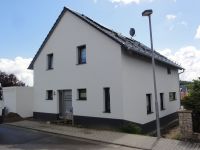 29.-Neubau-Einfamilienhaus-mit- Garage- Aussenputz- und- Aussenanlagen-in-Bad-Lgs